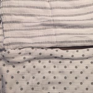 2 Aden and Anais swaddles